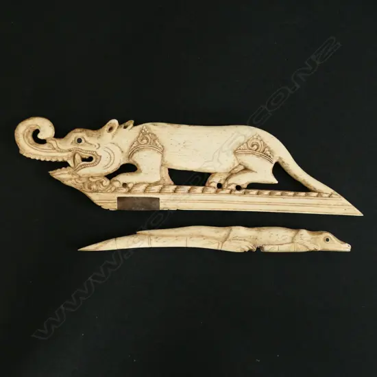 Carved with a mythical Kylin held on a carved crocodile-form support,