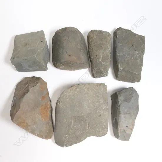 Seven Māori old adze fragments,