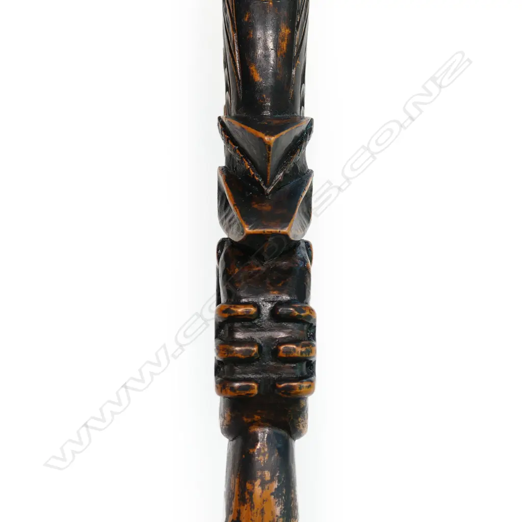 A 20thC Māori carved kauri waihaika hand club Image 1++
