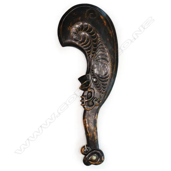A 20thC Māori carved kauri waihaika hand club