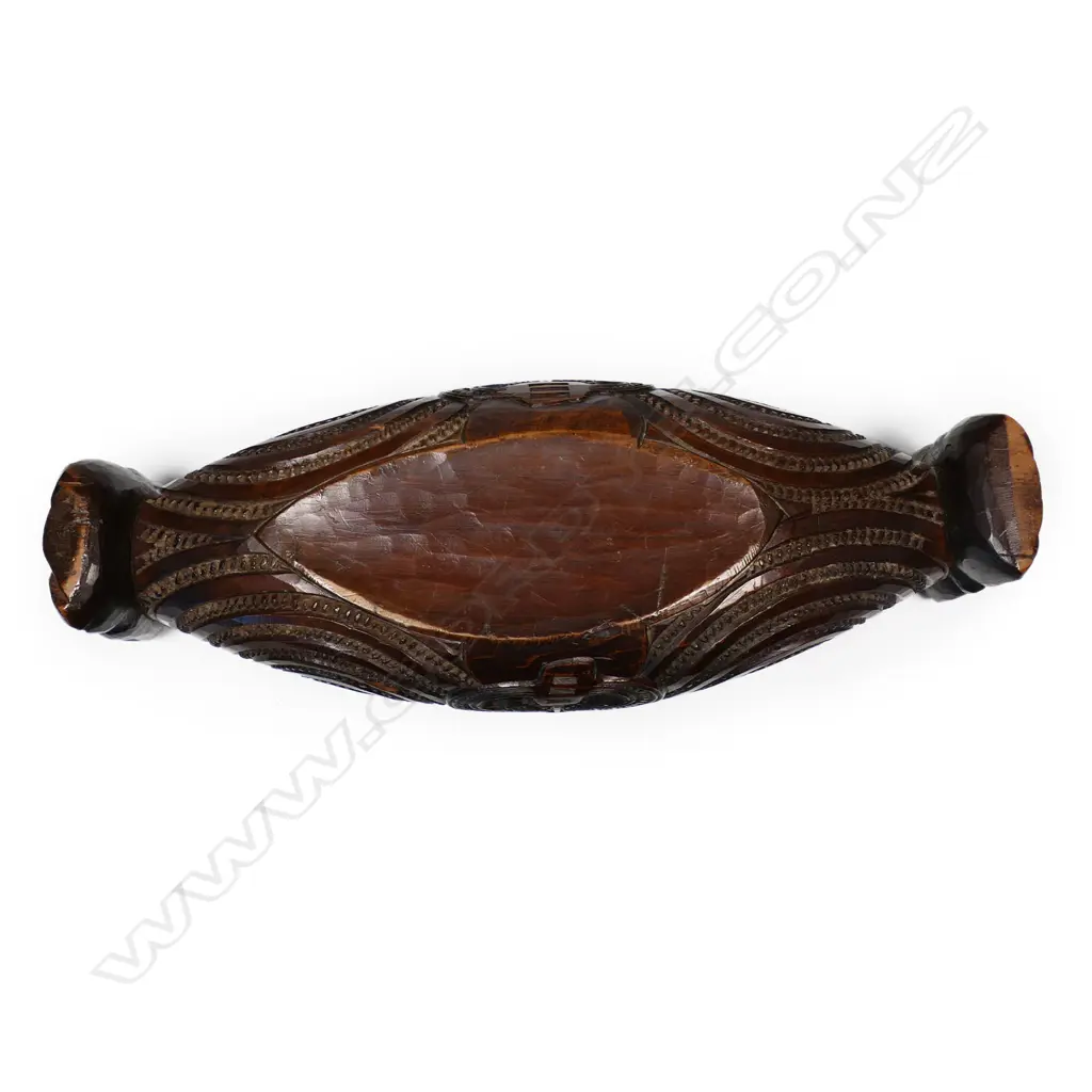 A vintage Māori carved waka huia Image 1++