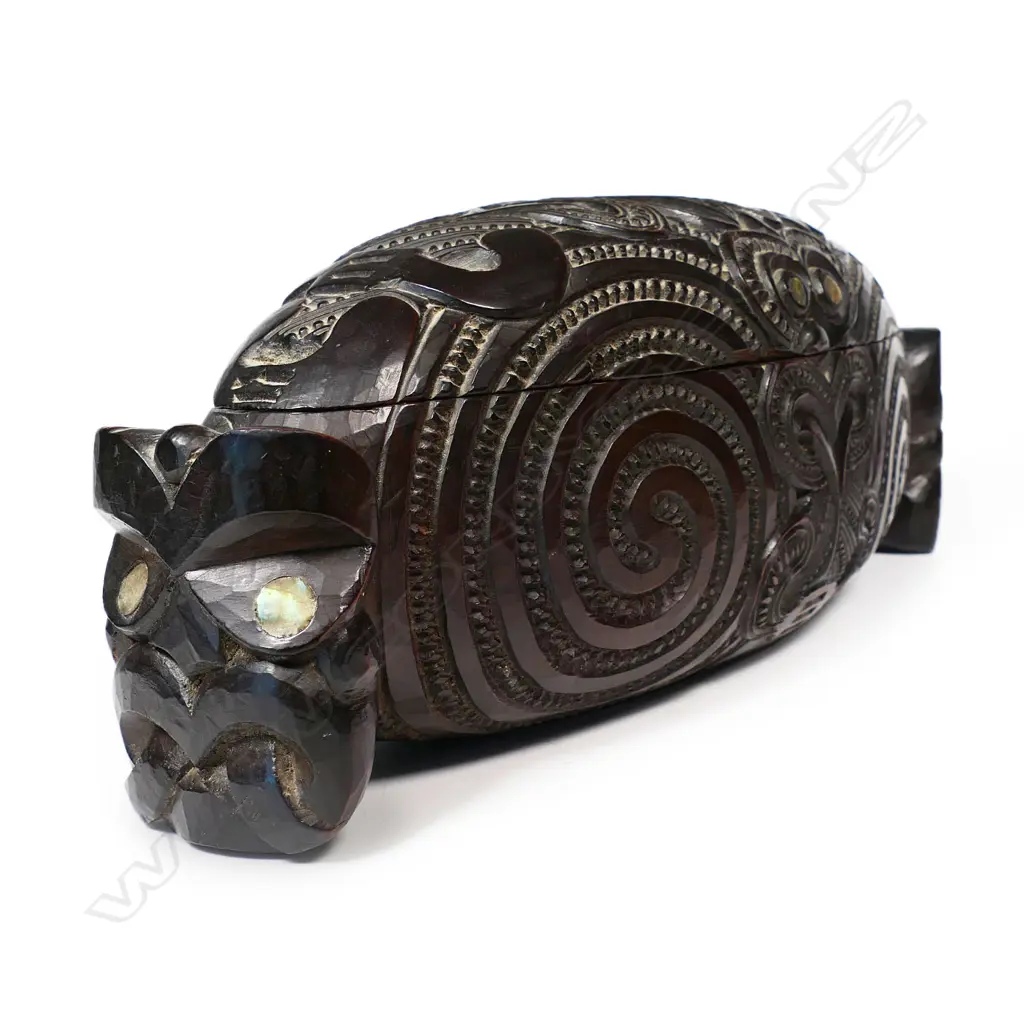 A vintage Māori carved waka huia Image 1++