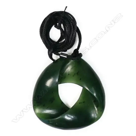 Omni Caeon carved pounamu moebius eclipse pendant,