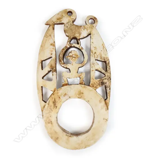 A Solomon Islands carved tridacna sacred Barava,