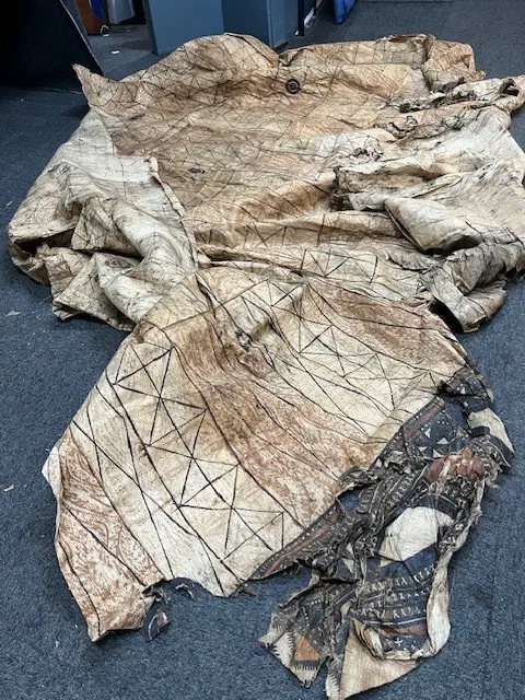 A large old tapa in distressed condition, Image 1++