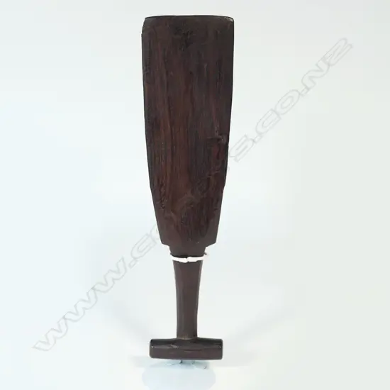 An old Pacific Island carved hardwood hand club with flat blade and T-form handle,