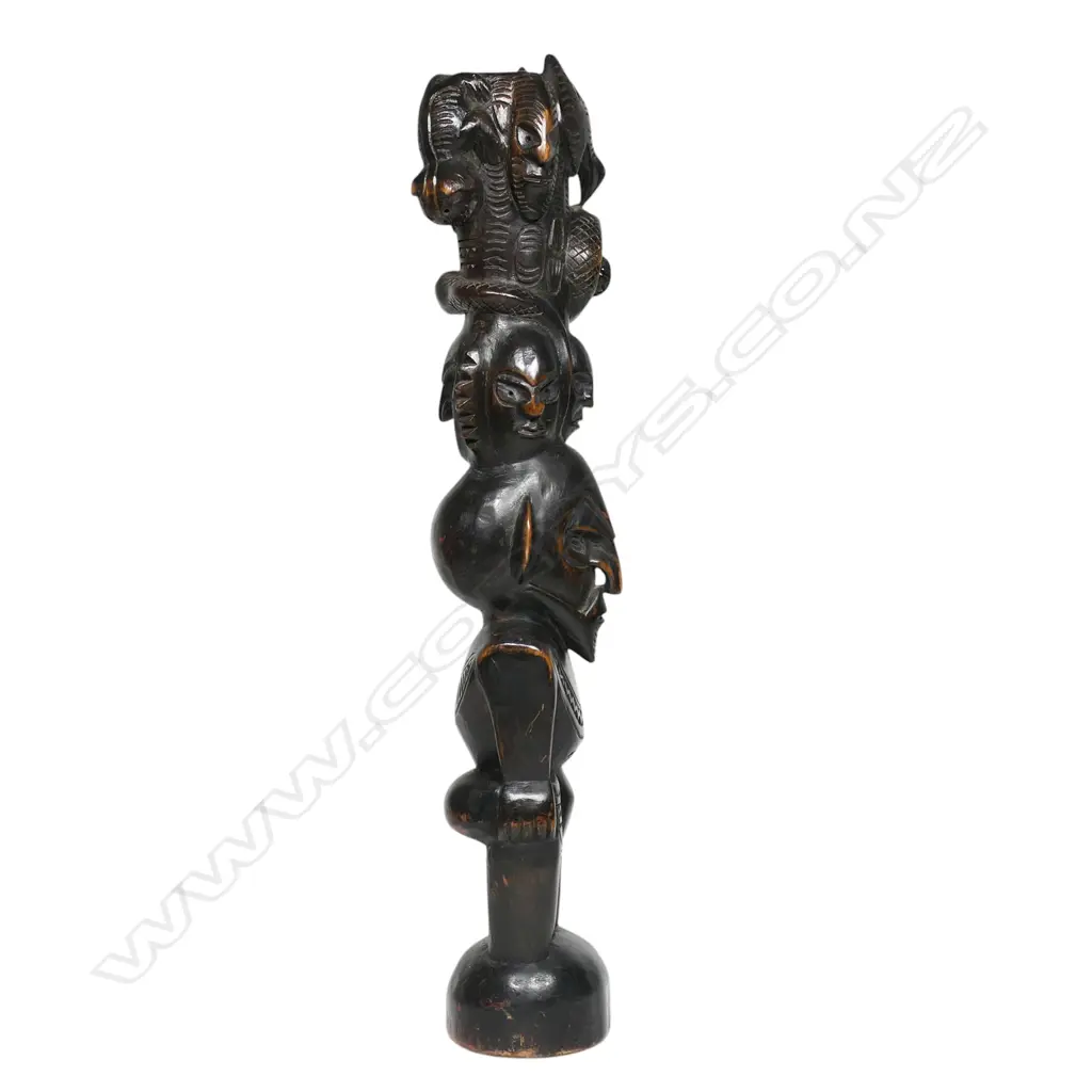 A vintage PNG carved wooden totem figure, Image 1++