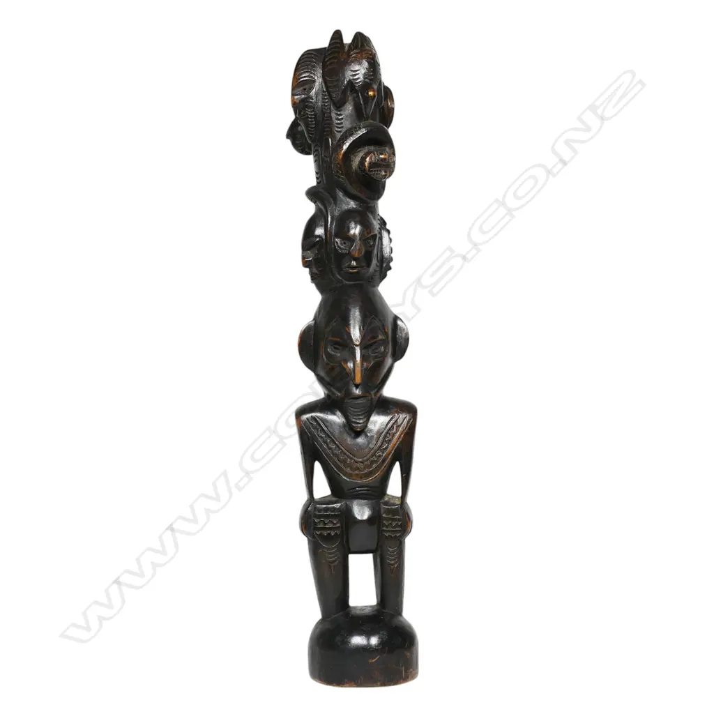 A vintage PNG carved wooden totem figure, Image 1++