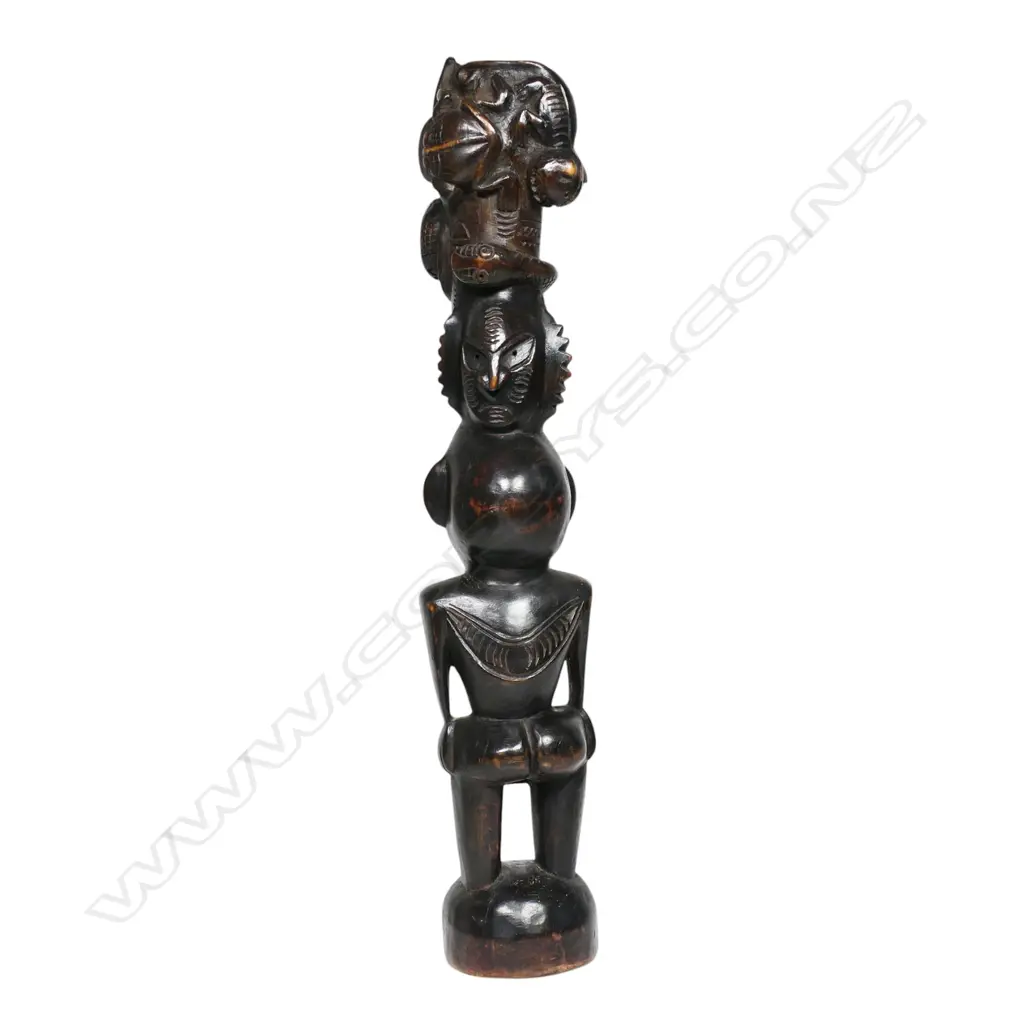 A vintage PNG carved wooden totem figure, Image 1++