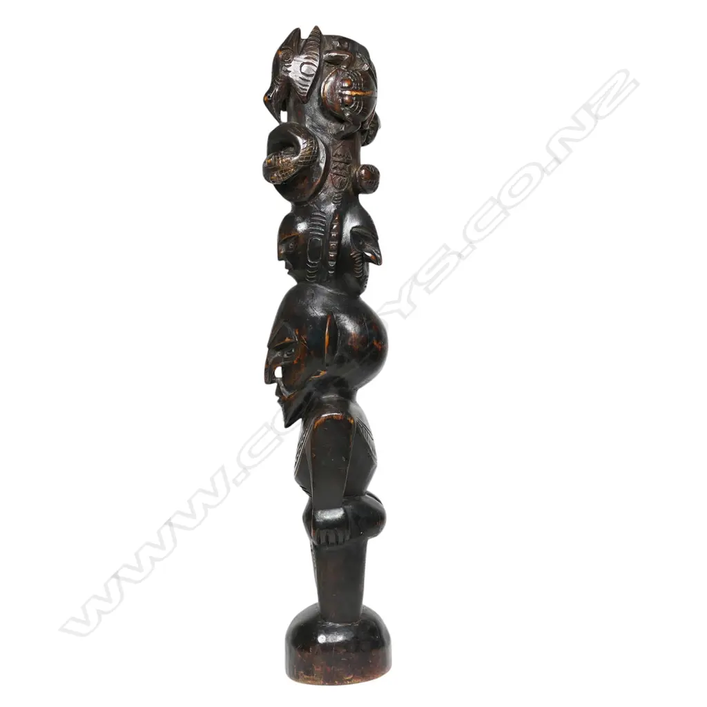 A vintage PNG carved wooden totem figure, Image 1++