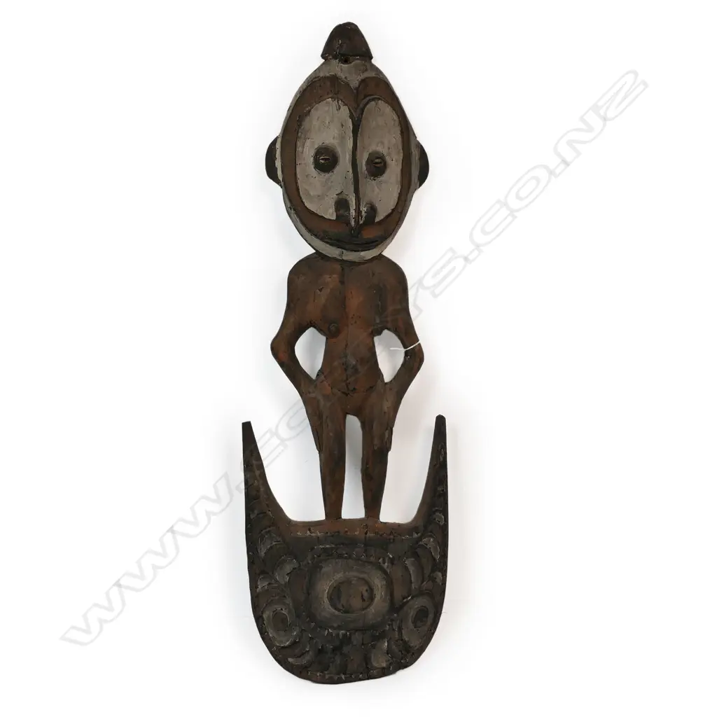 PNG figure carved food hook, pigmented finish. H.940mm. Provenance: Ex. The Estate of John Perry. Image 1++