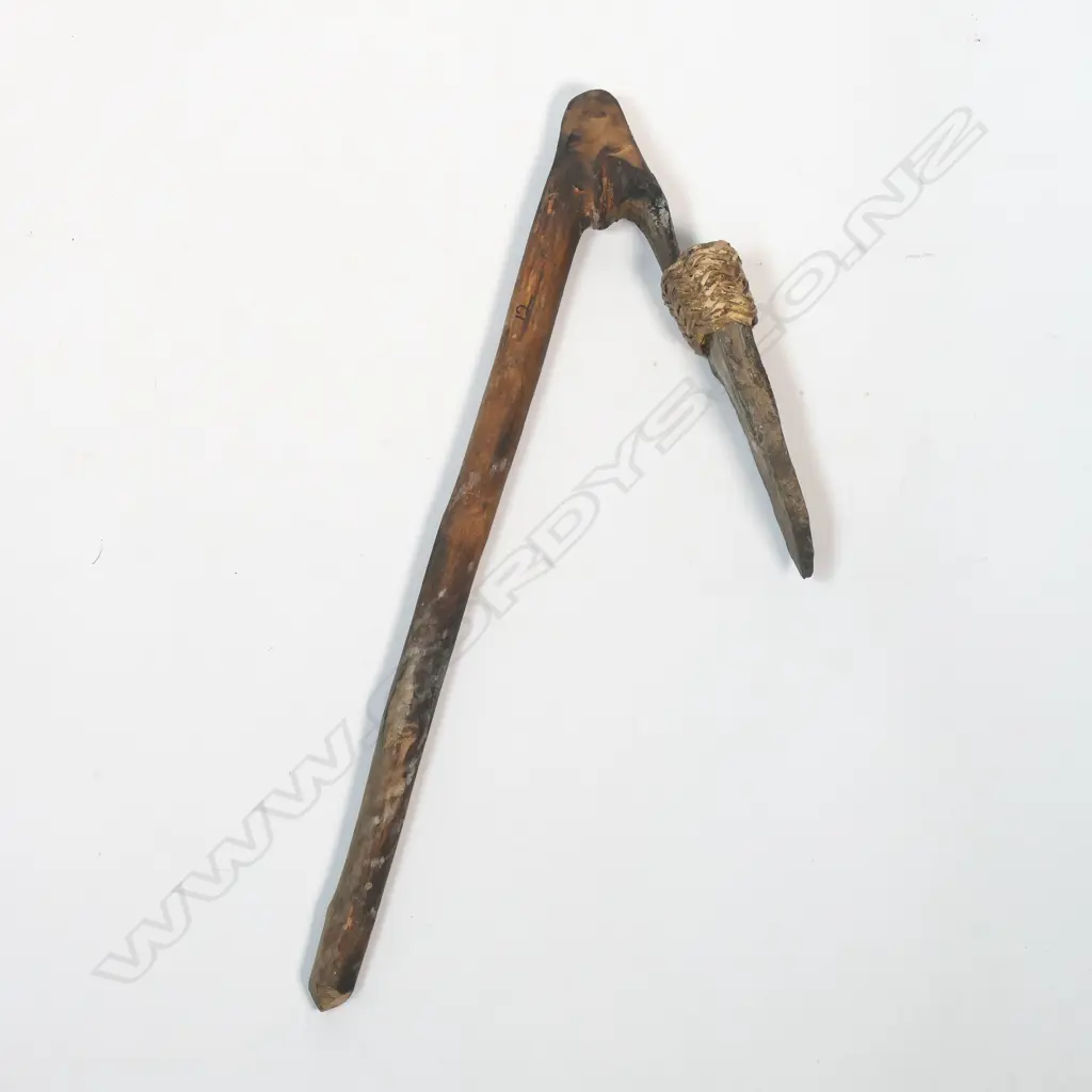 A hafted stone adze, Image 1++