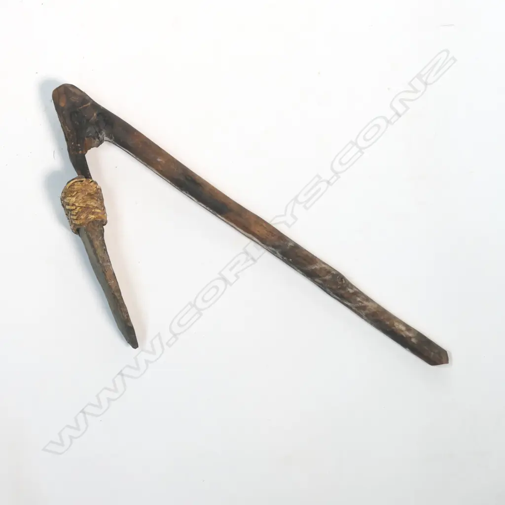 A hafted stone adze, Image 1++