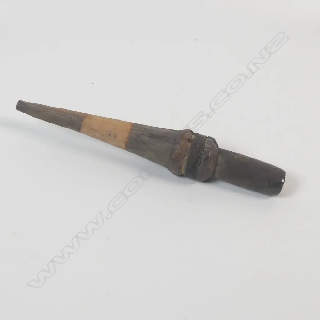 A hafted stone sago pounder, Image 1++