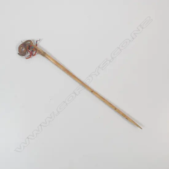 A bone lime spatula,