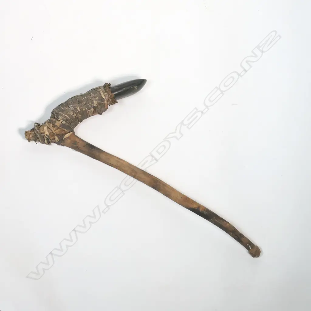 A hafted stone adze, Image 1++