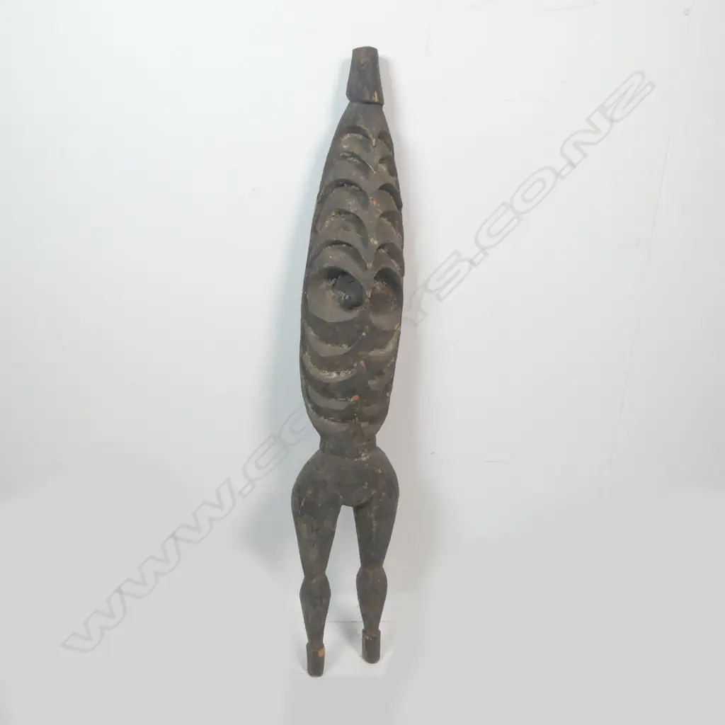 A carved figure, Image 1++