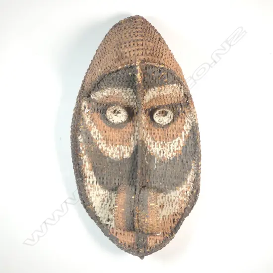 A woven mask from Papua New Guinea, Maprik Sepik. Vendor purchase Ambunti. H.650mm.