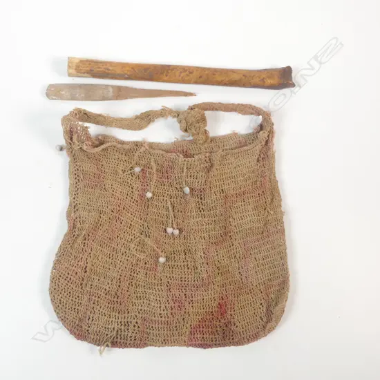 A bilum bag and cassowary bone sheath,