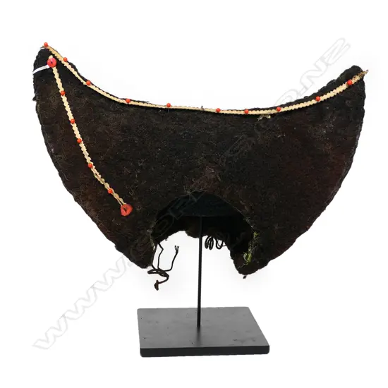 A PNG Huli Tribe bachelor's headdress,