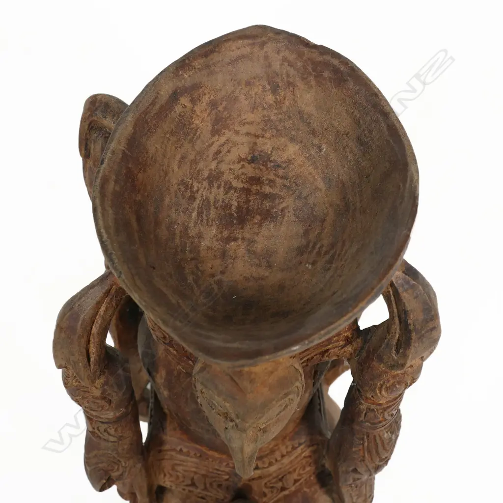 PNG finely carved pigment pot with stylised figured handles crocodiles and masks. H.200mm. Provenance: Ex. The Estate of John Perry. Image 1++