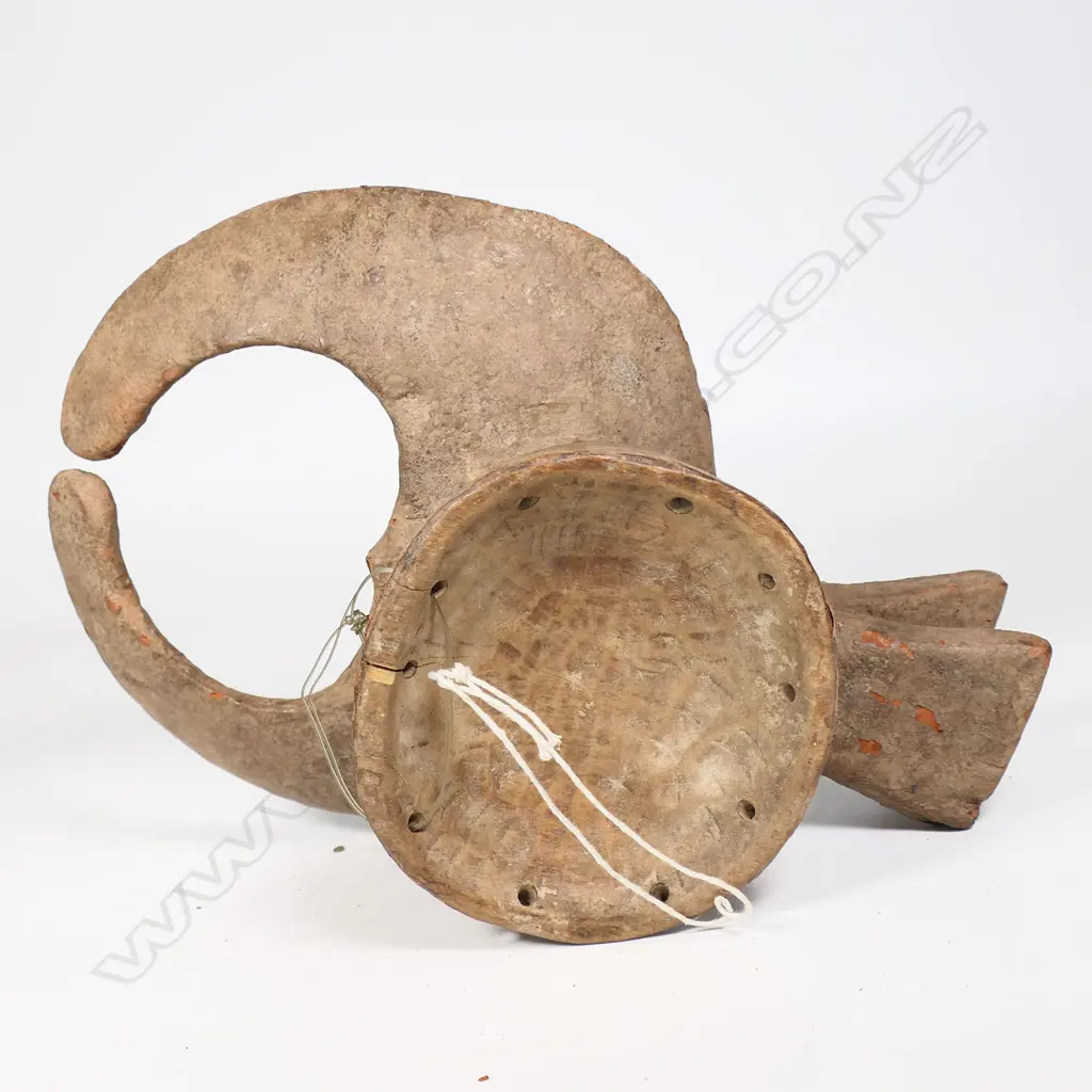 Nigerian Mama buffalo mask carved wood with natural pigment and red finish. L.330mm Image 1++