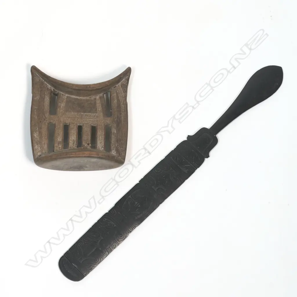 An Ethiopian headrest & carved wood sword, Image 1++