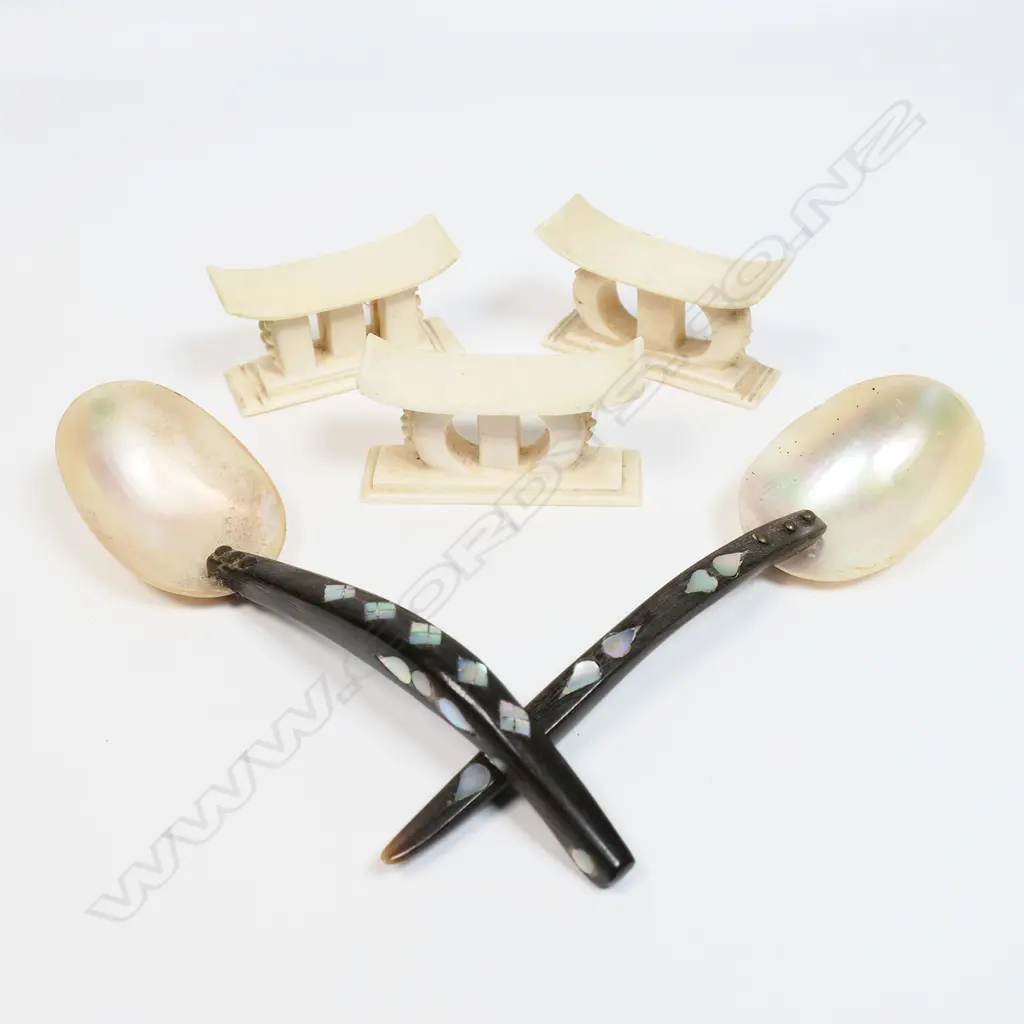 Three African miniature ivory headrests (a pair and one other) together with a pair of tribal spoons, Image 1++