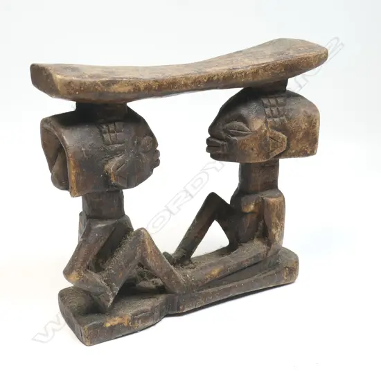 African carved wood headrest,