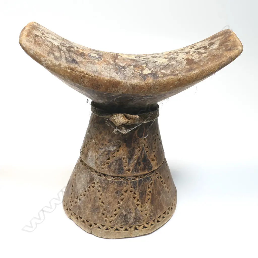 Two African carved wood headrests, tapered form, curved tops. H's.160mm. Provenance: Ex. The Estate of John Perry. Image 1++