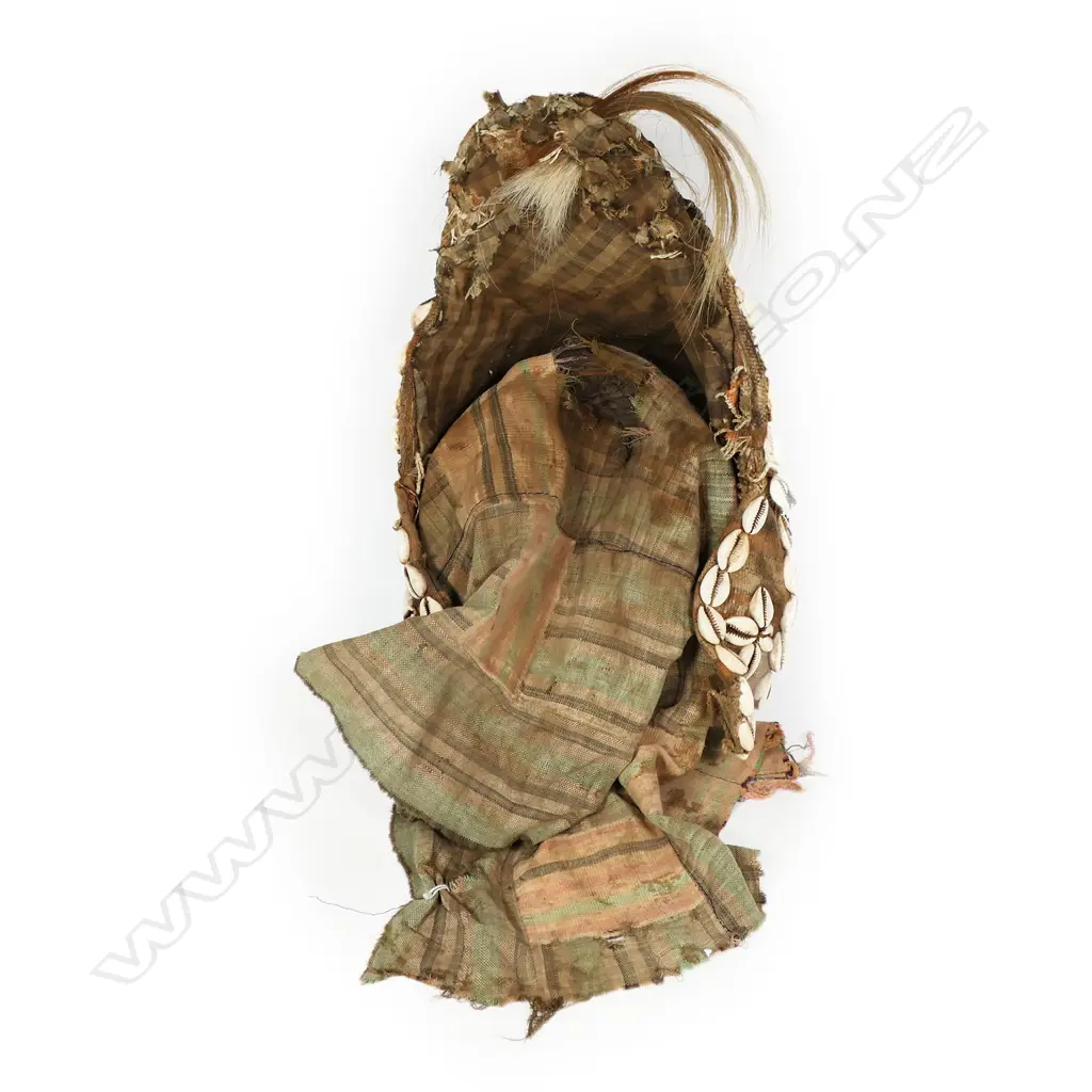 African female Dan mask carved wood with fabric backed head cover highlighted with shells. H.400mm. Provenance: Ex. The Estate of John Perry. Image 1++