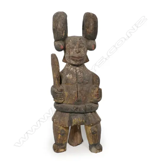 An Igbo Ikena wooden protection idol,