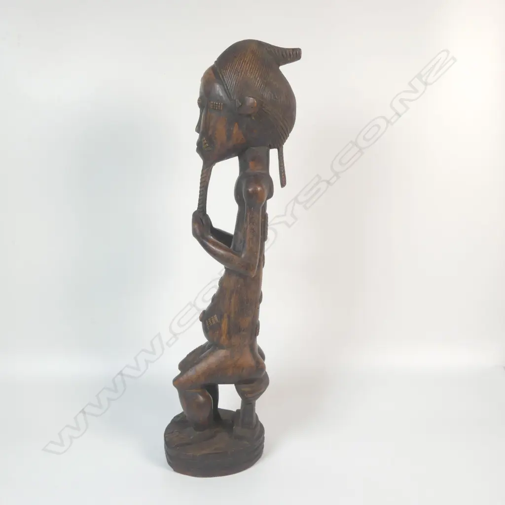 A carved Baoule figure Image 1++