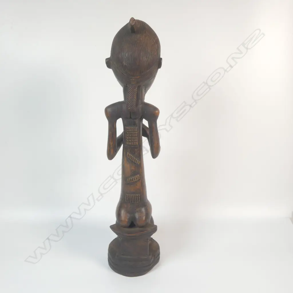 A carved Baoule figure Image 1++