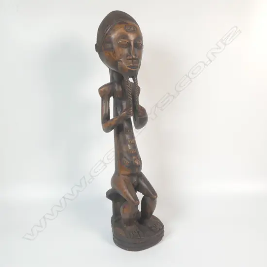 A carved Baoule figure