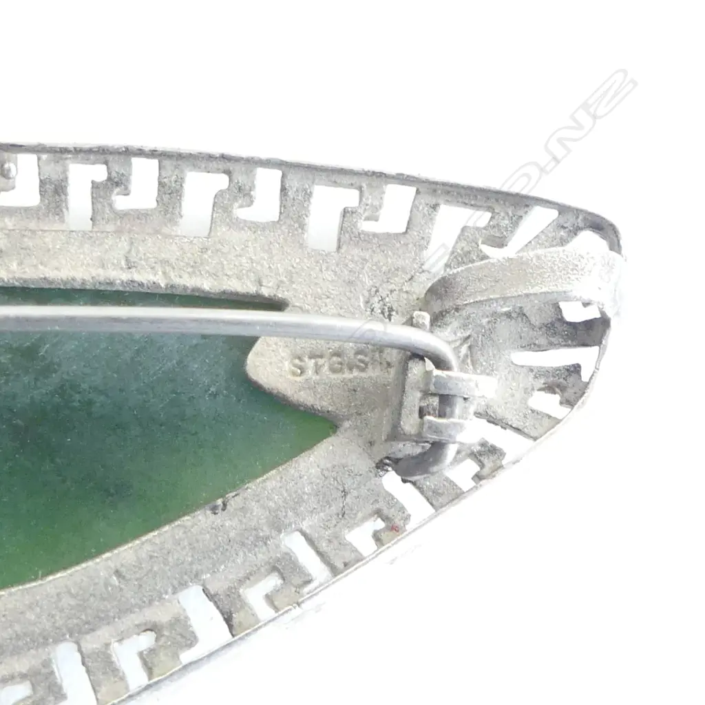 Modernist pounamu & silver brooch. Stylised Greek key border W.60mm Image 1++