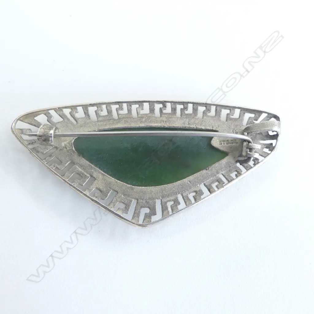 Modernist pounamu & silver brooch. Stylised Greek key border W.60mm Image 1++