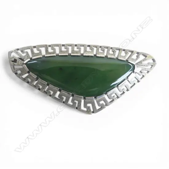 Modernist pounamu & silver brooch. Stylised Greek key border W.60mm