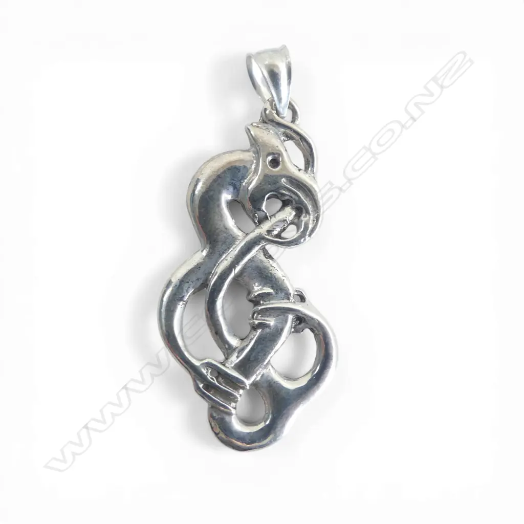Contemporary Maori cast silver scrolling Mania pendant tail looping through mouth H.50mm Image 1++