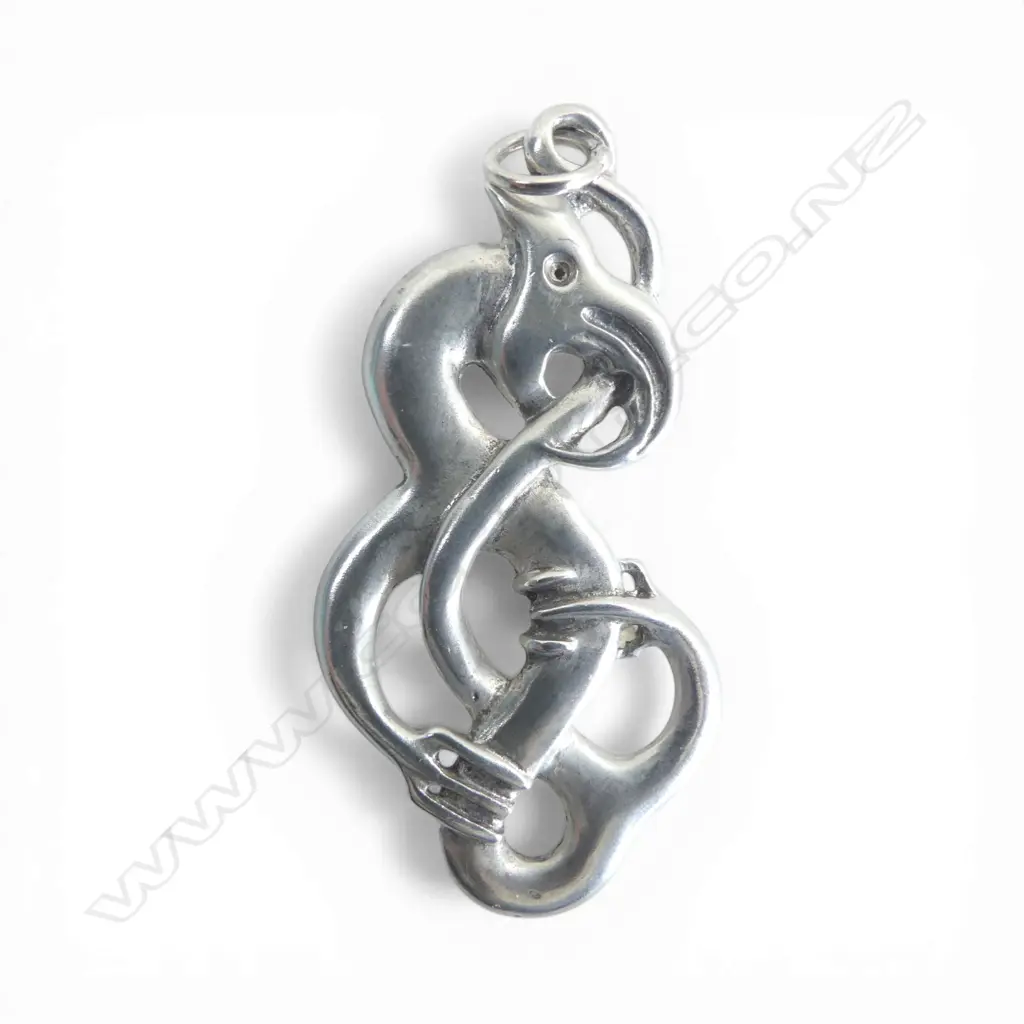 Contemporary Maori cast silver scrolling Mania pendant tail looping through mouth H.50mm Image 1++