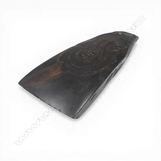 An old Māori black stone toki (adze),