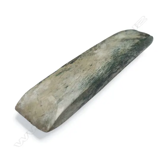 An old Māori pounamu toki (adze),