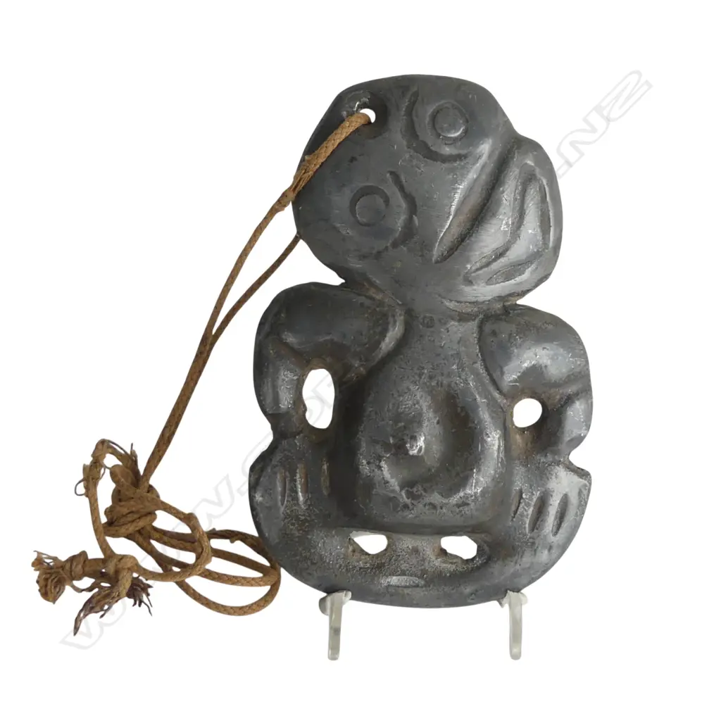 An old and uncommon Māori cast solid lead hei tiki, Image 1++