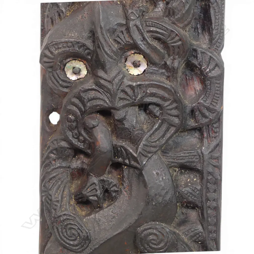 An old Māori carved ammo whare front board, Image 1++