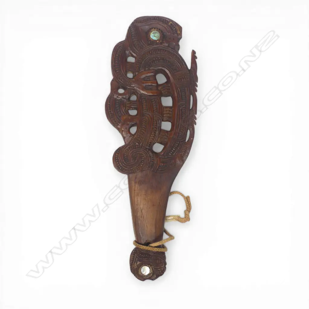 A 20thC Māori carved ceremonial māripi hand club, Image 1++