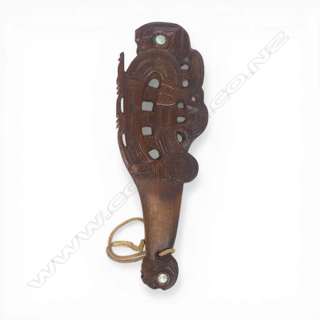 A 20thC Māori carved ceremonial māripi hand club, Image 1++