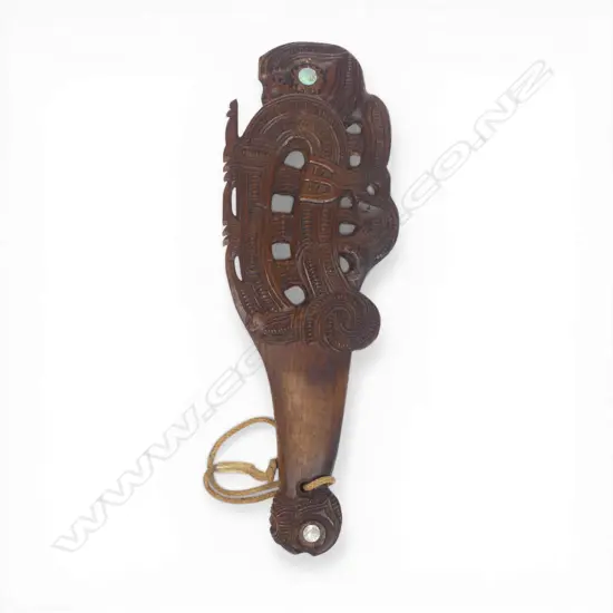 A 20thC Māori carved ceremonial māripi hand club,