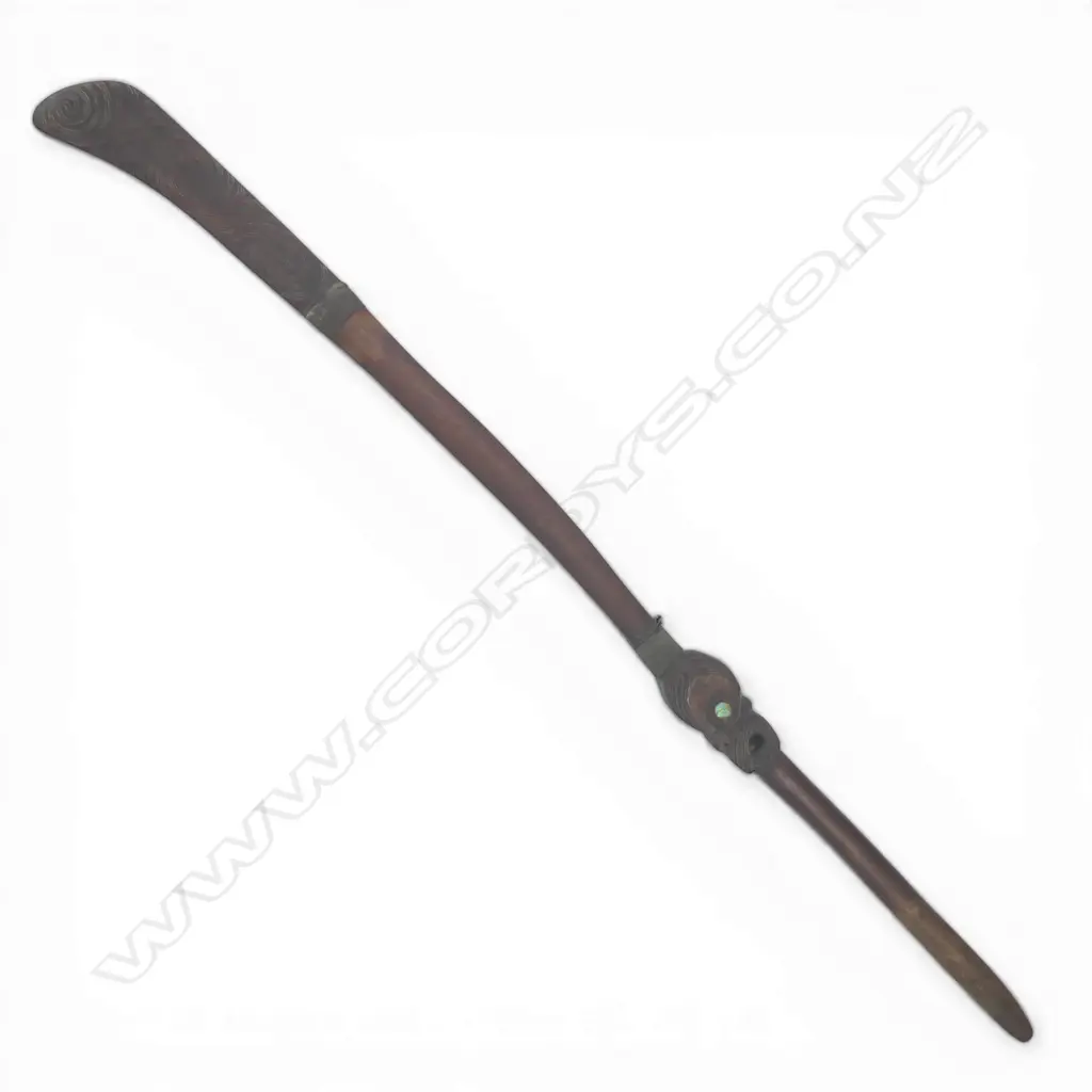 A mid / late 20thC Māori carved hardwood long shafted uncommon form club, Image 1++