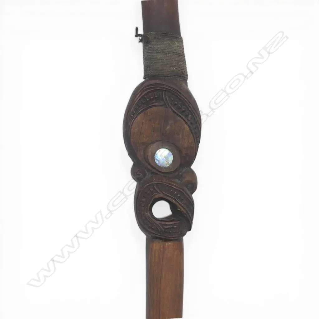 A mid / late 20thC Māori carved hardwood long shafted uncommon form club, Image 1++