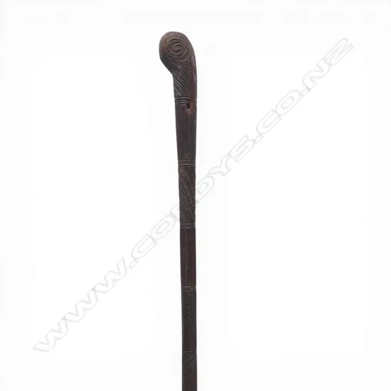 A 19thC entirely Māori carved toko toko (walking stick),